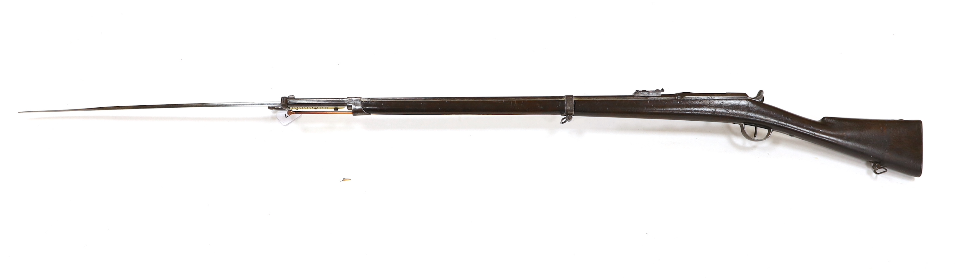 A French Chassepot bolt action rifle 1865-1874 with regulation, iron mounts, and 1868 brass handle bayonet dated 1868, barrel 79cm